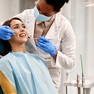 Patient undergoing treatment in the dentist’s chair